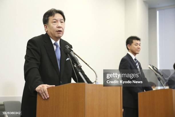 Yukio Edano , head of the Constitutional Democratic Party of Japan, and Kenta Izumi, policy chief of the Democratic Party for the People, attend at a...