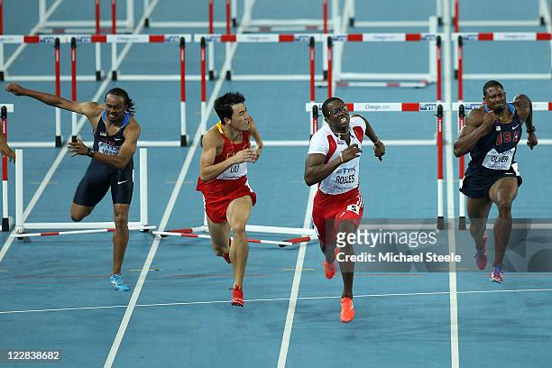 Dayron Robles of Cuba and Xiang Liu of China push for the finish line ahead of Aries Merritt of United States and David Oliver of United States...