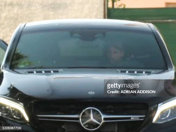 This video grab from AFPTV shows Barcelona's Argentine forward Lionel Messi arriving by car at the Joan Gamper Ciutat Esportiva in Sant Joan Despi...