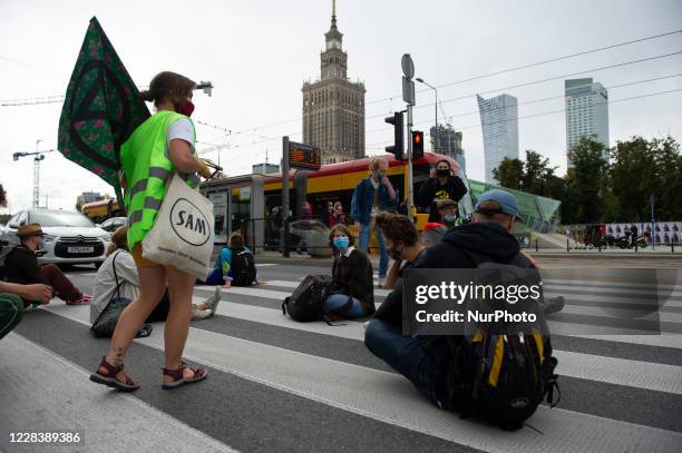 Climate activists occupy the street during a civil disobedience action September 7, 2020 in Warsaw, Poland. A few hundred protester took part in a...