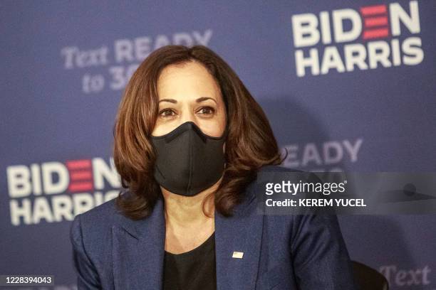 Democratic vice presidential nominee and Senator from California, Kamala Harris, looks on during a "Build Back Better" roundtable with Black...