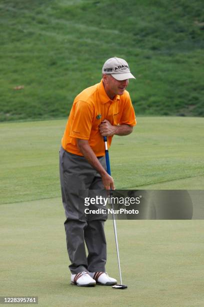 Gary Hallberg of USA, check his 8th hall putting line during the PGA Tour Songdo IBD championship second round at Jack Nicklaus golf club in Incheon,...