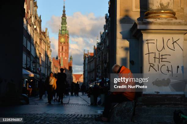 Sun set view of Dluga street with Gdansk Town Hall in the background. On August 31 in Gdansk, Poland.