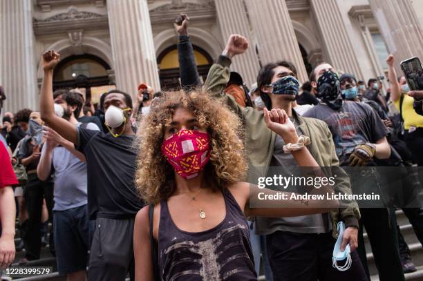 New Yorkers protest during a rally against the killing of George Floyd by a police officer in Minneapolis at Wall Street on May 28, 2020 in New York,...