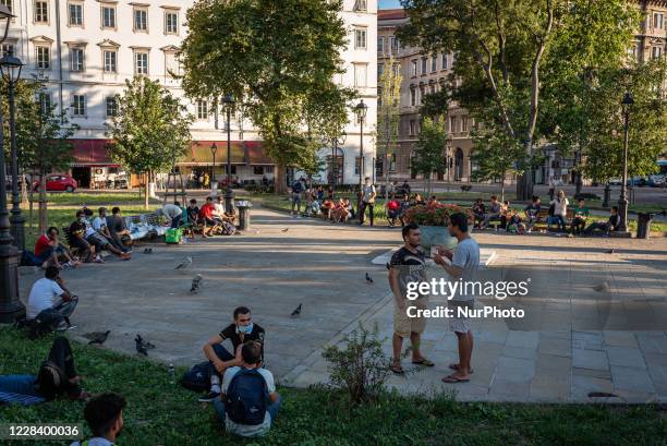 Main view of Piazza della Liberta with refugees and members of NGO. In Trieste, Italy, on August 15, 2020.