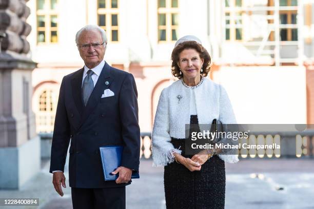 King Carl XVI Gustaf and Queen Silvia of Sweden attend the opening of the Swedish Parliament for the fall session at the Riksdag Parliament building...