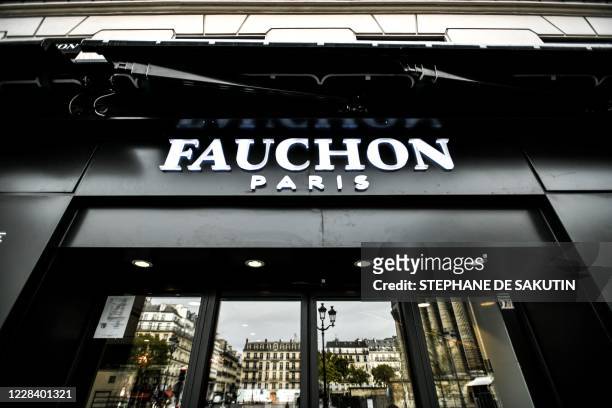 This picture taken on September 8, 2020 shows the logo outside a shop of French gourmet food company Fauchon at Place de la Madeleine in Paris. - A...