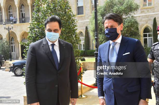 Italian Prime Minister Giuseppe Conte meets with interim Prime Minister Hassan Diab at the presidential palace in Lebanon, in Beirut on September 8,...