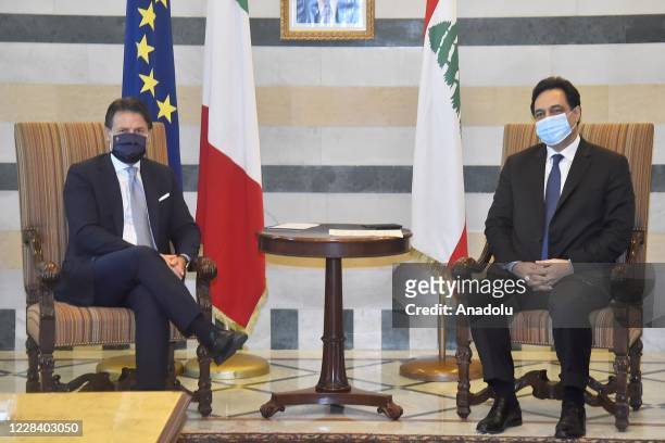 Italian Prime Minister Giuseppe Conte meets with interim Prime Minister Hassan Diab at the presidential palace in Lebanon, in Beirut on September 8,...