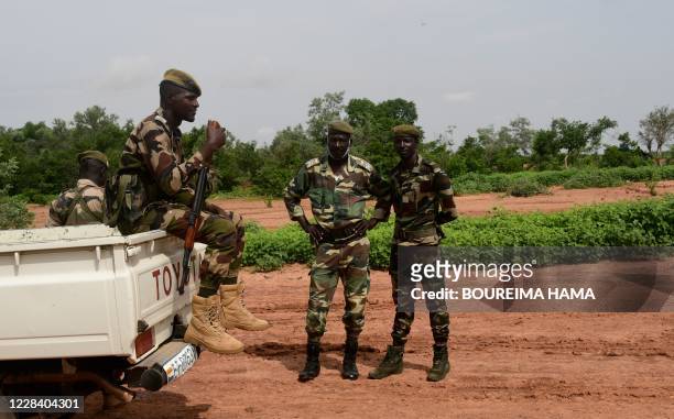 Niger security forces patrol in the Kouré Giraffe reserve on August 21, 2020. - One of the most famous animal sanctuaries in the Sahel faces a...