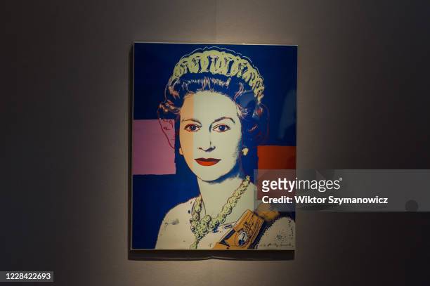 Queen Elizabeth II' from: Reigning Queens screenprint in colours with diamond dust by Andy Warhol is displayed during a press preview of 'Prints &...