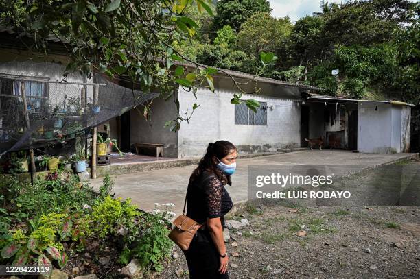 Colombian Gladys Betancourt mother of Oscar Obando one of the eight youngsters murdered at a house in a rural area of Samaniego, Narino department,...