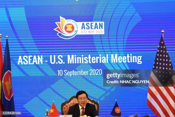 Vietnam's Foreign Minister Pham Binh Minh addresses a live video conference during the Association of Southeast Asian Nations -US Ministerial...