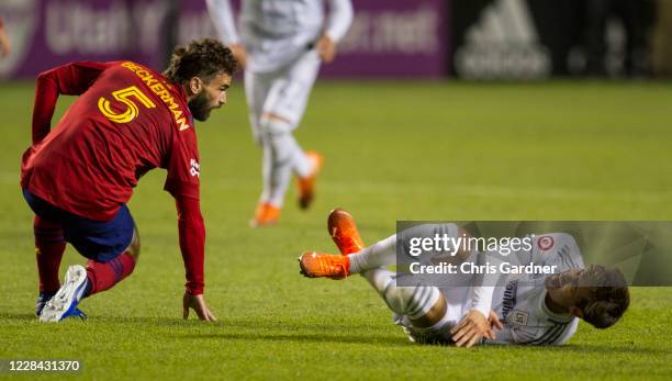 Kyle Beckman of Real Salt Lake stands up after slide tackling Francisco Ginella of the Los Angeles FC during their game at Rio Tinto Stadium on...