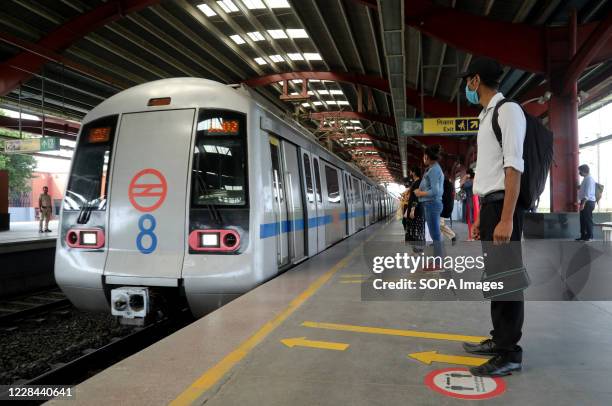 Indian Delhi Metro Rail Corporation Photos and Premium High Res ...