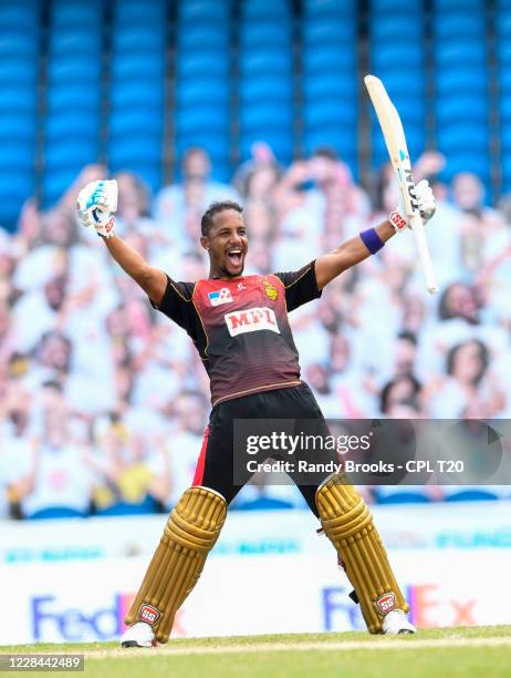 Lendl Simmons of Trinbago Knight Riders celebrates winning the Hero Caribbean Premier League Final match 33 between Trinbago Knight Riders and St...