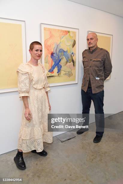 Cat Roissetter and Jake Chapman attend a private view of new exhibition 'English Filth' by artist Cat Roissetter at The Cob Gallery on September 10,...