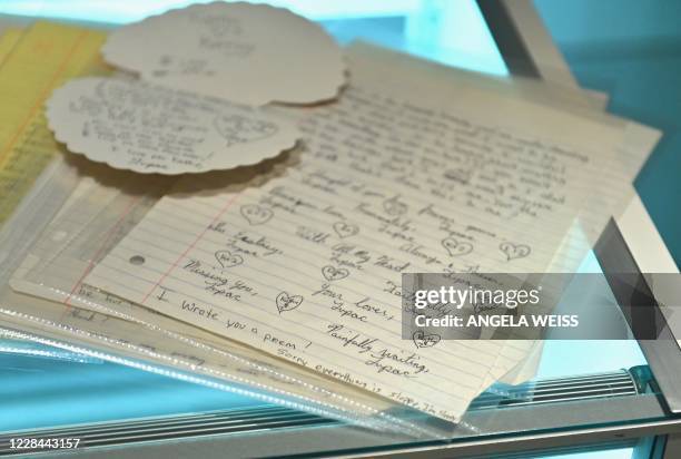 An archive of twenty-two love letters from Tupac Shakur to a high school sweetheart is displayed during a press preview at Sotheby's for their...