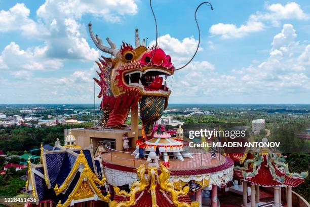 An aerial view taken on September 11, 2020 shows the Buddhist temple Wat Samphran in Nakhon Pathom, some 40km west of Bangkok. - Wat Samphran is a...