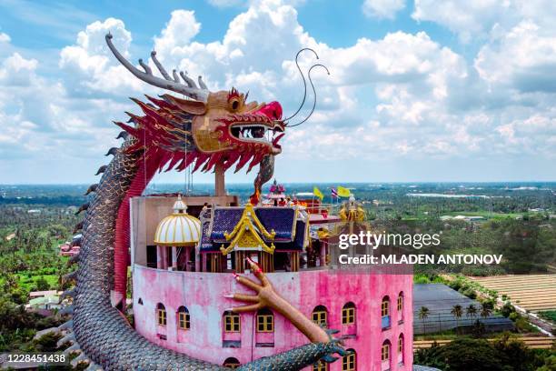 An aerial view taken on September 11, 2020 shows the Buddhist temple Wat Samphran in Nakhon Pathom, some 40km west of Bangkok. - Wat Samphran is a...