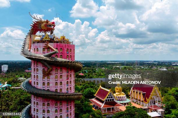 An aerial view taken on September 11, 2020 shows the Buddhist temple Wat Samphran in Nakhon Pathom, some 40km west of Bangkok. - Wat Samphran is a...