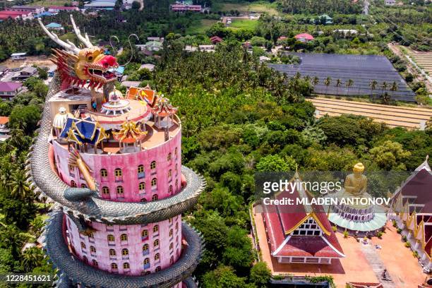 An aerial view taken on September 11, 2020 shows the Buddhist temple Wat Samphran in Nakhon Pathom, some 40km west of Bangkok. - Wat Samphran is a...