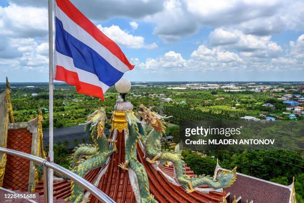 Dragon figures decorate the roof of the Buddhist temple Wat Samphran in Nakhon Pathom, some 40km west of Bangkok, on September 11, 2020. - Wat...