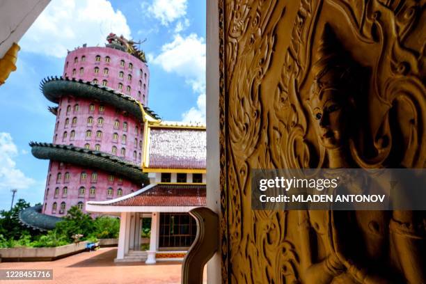 The tower with the giant dragon is seen at the Buddhist temple Wat Samphran in Nakhon Pathom, some 40km west of Bangkok, on September 11, 2020. - Wat...