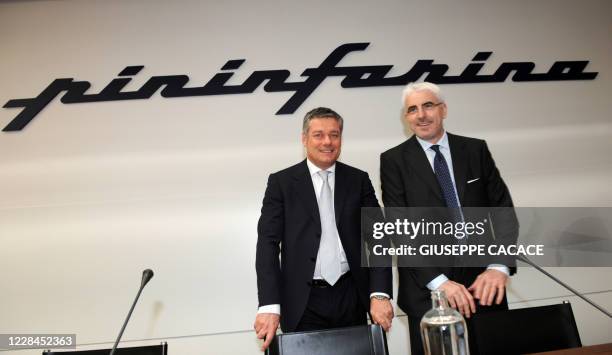 Italian design studio head and Pininfarina President Paolo Pininfarina and Pininfarina CEO Silvio Pietro Angori pose before a conference as part of...