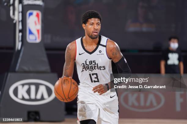 Paul George of the LA Clippers handles the ball against the Denver Nuggets during Game Five of the Western Conference Semifinals of the NBA Playoffs...