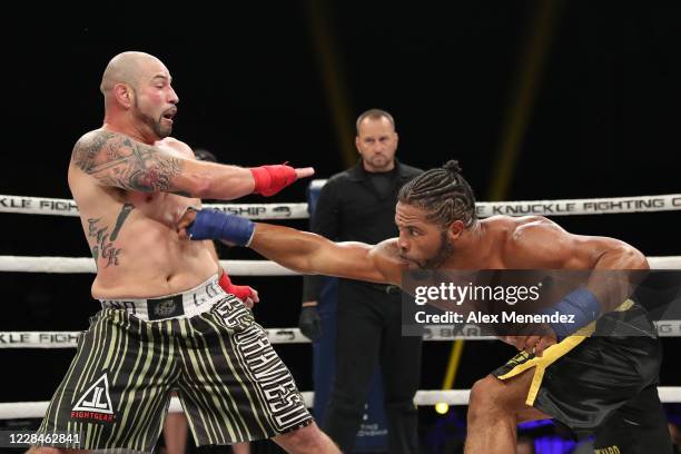 Lorenzo Hunt punches Erick Lozano during the Bare Knuckle Fighting Championships at the Ocean Center on September 11, 2020 in Daytona Beach, Florida.