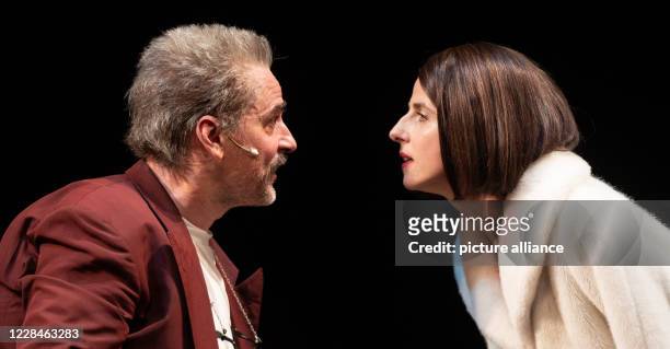 September 2020, Hamburg: Jens Harzer and Marina Galic play during the dress rehearsal of the comedy Der Geizige oder Die Schule der Lügner, by...
