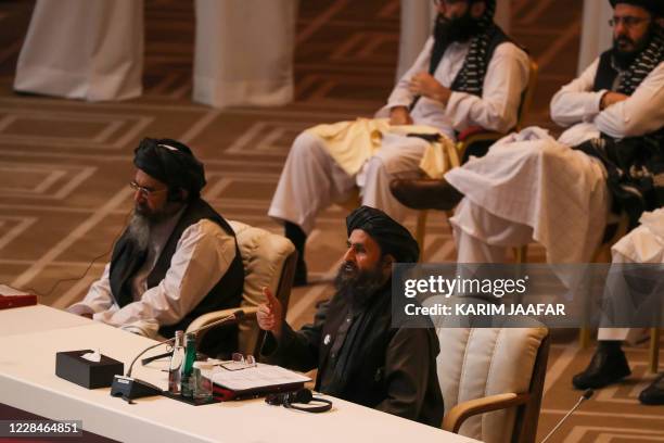 Taliban co-founder Mullah Abdul Ghani Baradar speaks during the opening session of the peace talks between the Afghan government and the Taliban in...