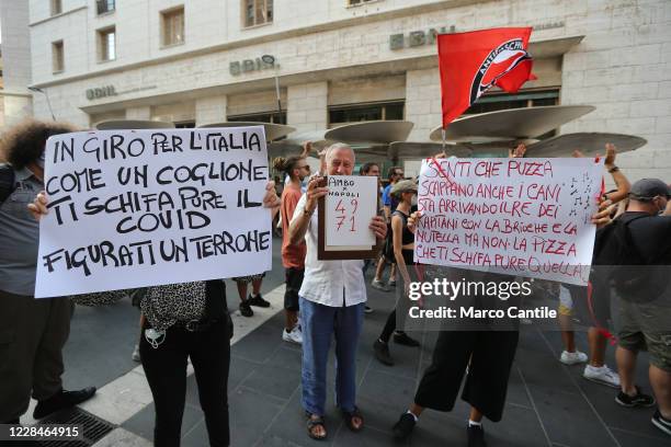 Group of people, with banners, protest against the political rally of the leader of the League, Matteo Salvini, for the regional elections in...