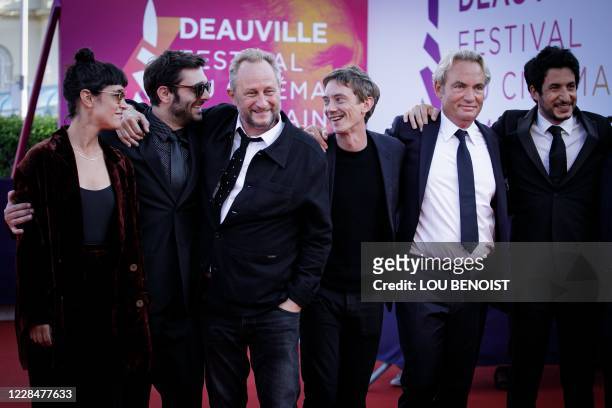 Belgian actor Benoit Poelvoorde poses flanked by French actors Vimala Pons, Pio Marmai, Swann Arlaud, Gilles Cohen and film director Douglas Attal on...