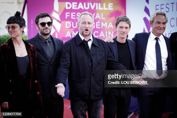 Belgian actor Benoit Poelvoorde poses flanked by French actors Vimala Pons, Pio Marmai, Swann Arlaud and Gilles Cohen on the red carpet to present...