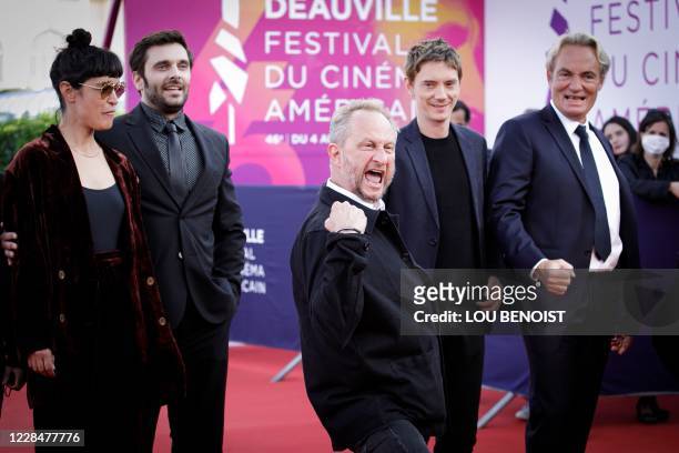 Belgian actor Benoit Poelvoorde poses flanked by French actors Vimala Pons, Pio Marmai, Swann Arlaud and Gilles Cohen on the red carpet to present...