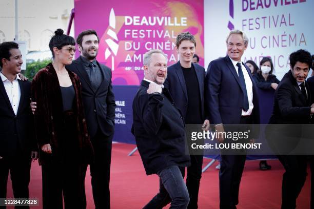 Belgian actor Benoit Poelvoorde poses flanked by French actors Sofiane Boudini, Vimala Pons, Pio Marmai, Swann Arlaud, Gilles Cohen and film director...