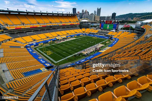 A photo of an empty stadium as the Pittsburgh Panthers kick off to start the game during the college football game between the Austin Peay Governors...