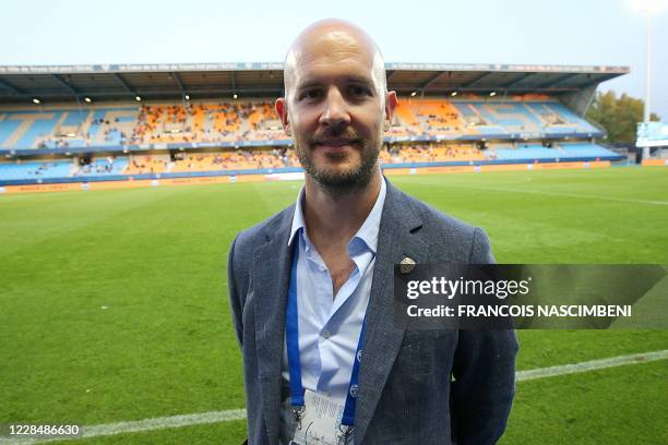 New president of the Esperance Sportive Troyes Aube Champagne football club Simon Cliff poses for pictures ahead of the French L2 football match...