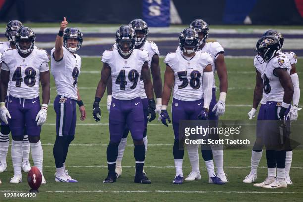 Justin Tucker of the Baltimore Ravens gives a thumbs up before the opening kick-off against the Cleveland Browns at M&T Bank Stadium on September 13,...