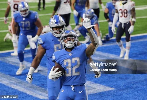 Andre Swift of the Detroit Lions celebrates a second quarter touchdown against the Chicago Bears at Ford Field on September 13, 2020 in Detroit,...