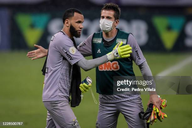 Everson of Atletico MG with the rosary in hands greets Victor in the interval of the match between Atletico MG and Red Bull Bragantino as part of...