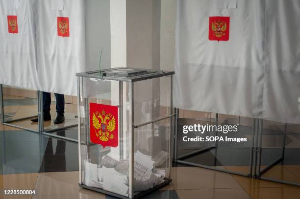 Ballot box with the coat of arms of the Russian Federation with ballots seen at a polling station. In 2020, elections in Russia will be held for...