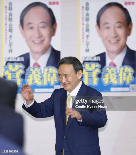 Japanese Chief Cabinet Secretary Yoshihide Suga, running in the ruling Liberal Democratic Party's presidential election, attends a rally in Tokyo on...