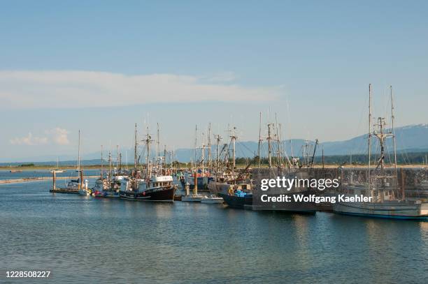 View of the fishing harbor with fishing boats of Comox on Vancouver Island, British Columbia, Canada.