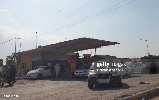 Vehicles queue in a long line for oil and propane tanks following oil shortages in Assad regime controlled areas including Aleppo, Latakia, Damascus...