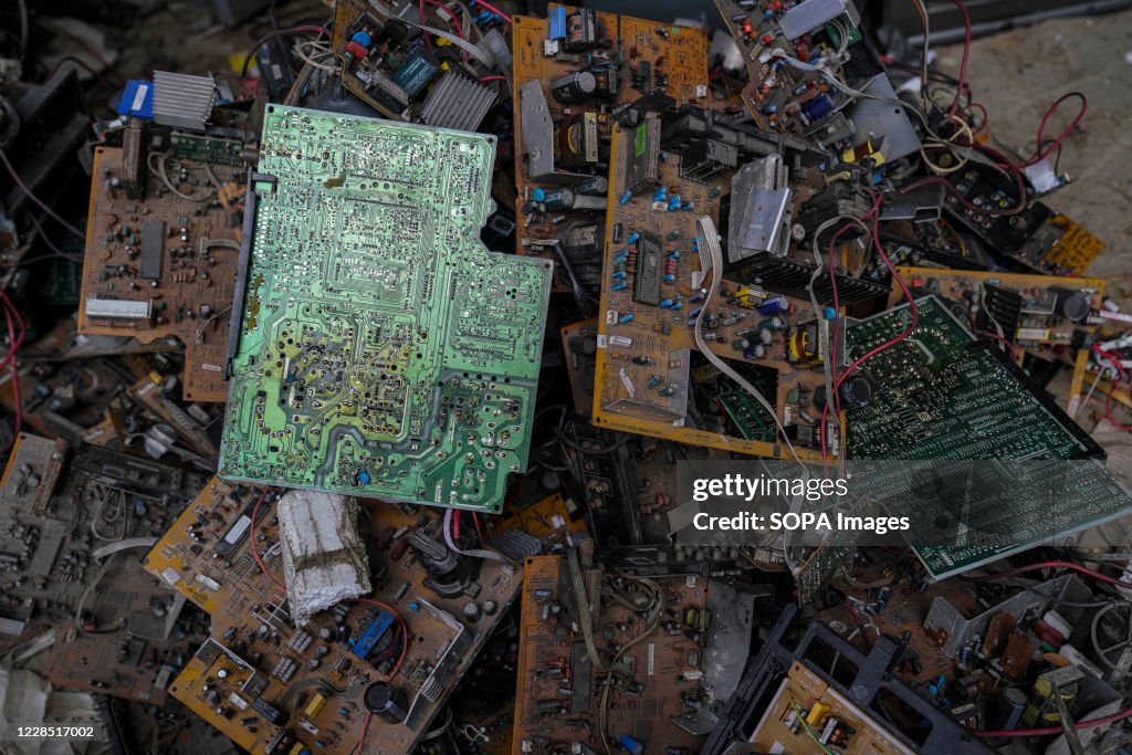 Box Tv Garbage Old TV components are discarded inside at a TV recycling scrap yard ...