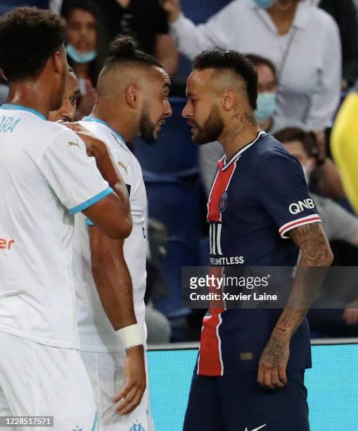 Dimitri Payet of Olympique de Marseille confronts Neymar Jr of Paris Saint-Germain during the Ligue 1 match between Paris Saint-Germain and Olympique...