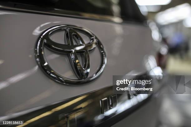 The Toyota Motor Corp. Logo is displayed on a vehicle sitting at the Toyota Kirloskar Motor Ltd. Plant in Bidadi, Karnataka, India, on Wednesday,...